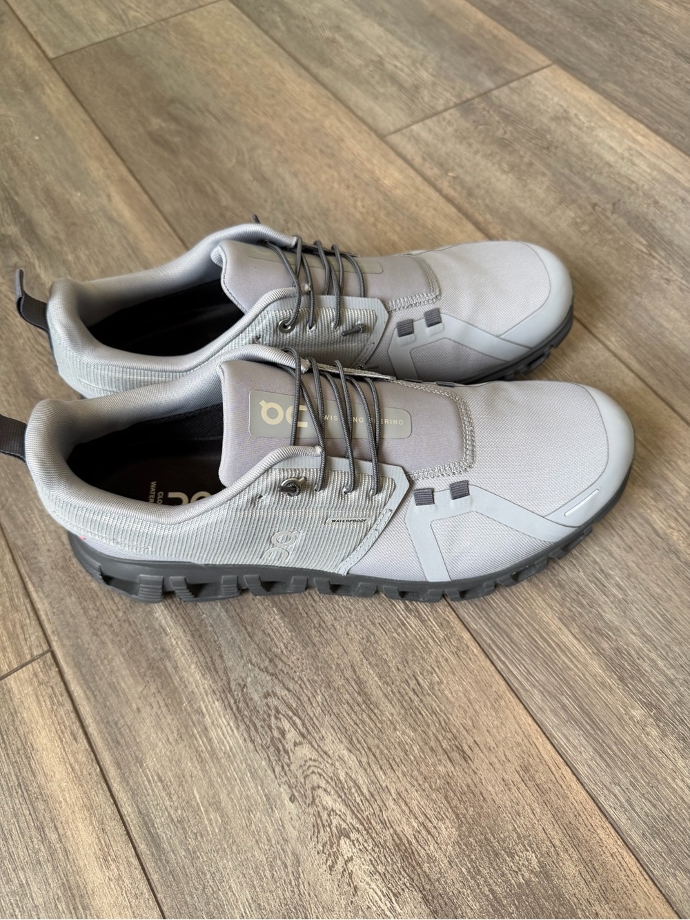 On Running Men's Light Grey Cloud Sneakers with Black Sole